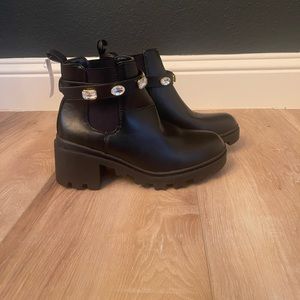 Nicole Miller black boots.